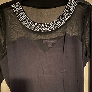 Roaman’s black top with rhinestones
